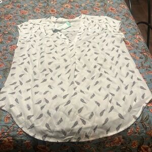 Feather design blouse.